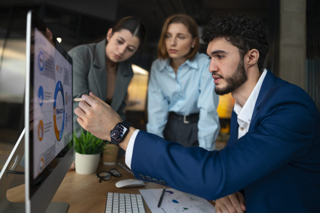 people office analyzing checking finance graphs